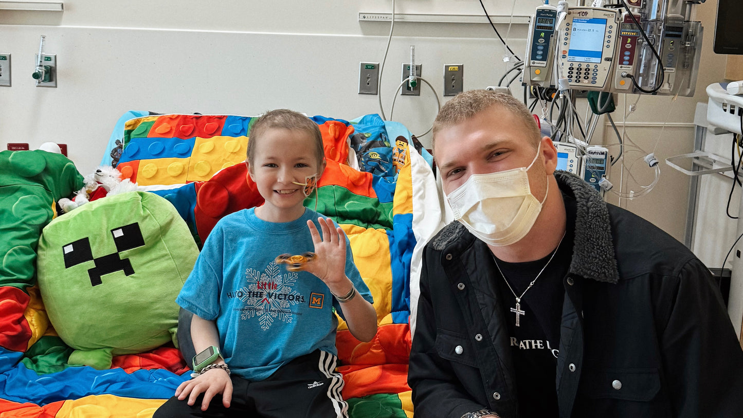 aidan hutchinson detroit lions nfl draft charity house of hutch hero