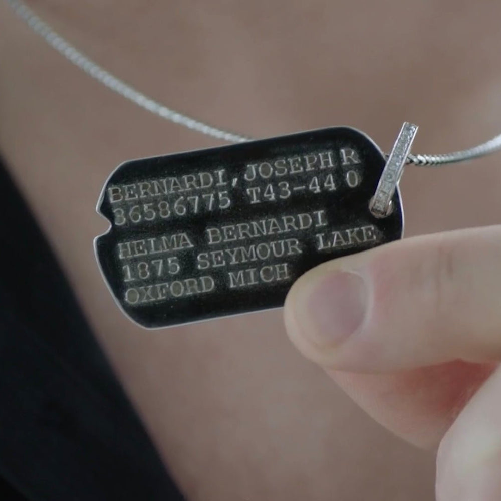 Aidan Hutchinson dog tag chain for USAA commerical