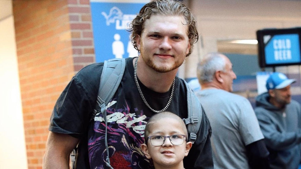 Aidan Hutchinson and Caleb Post after Detroit Lions vs Carolina Panthers game