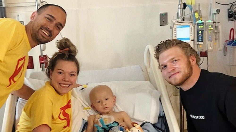 Aidan Hutchinson with Owen at Mott Children's Hospital