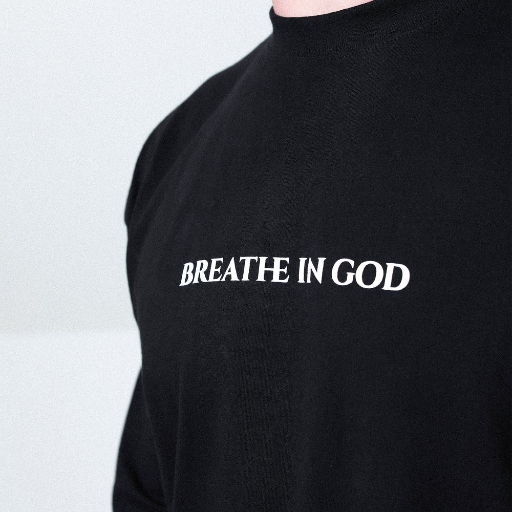 
                      
                        Aidan Hutchinson's Breathe In God LS Tee - Official merchandise from the House of Hutch.
                      
                    