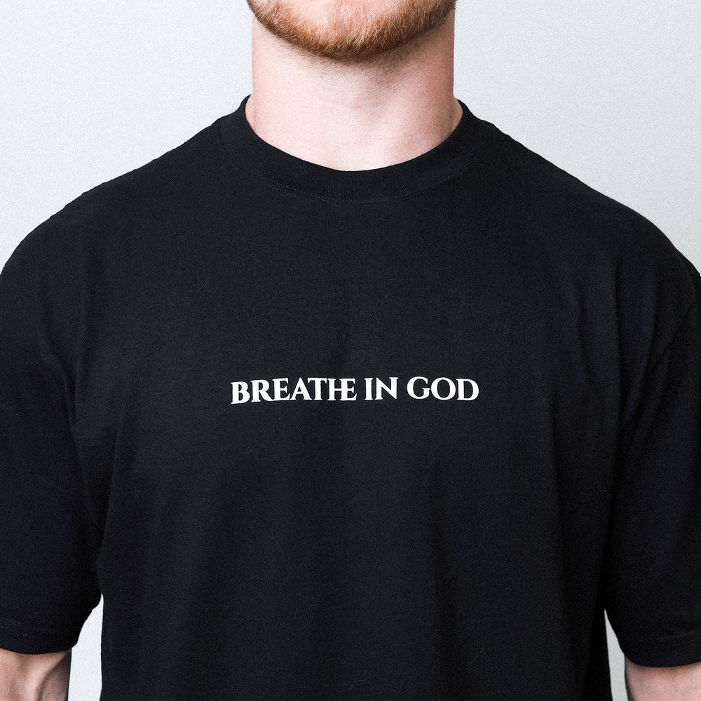 
                      
                        Aidan Hutchinson's Breathe In God Tee - Official merchandise from the House of Hutch.
                      
                    