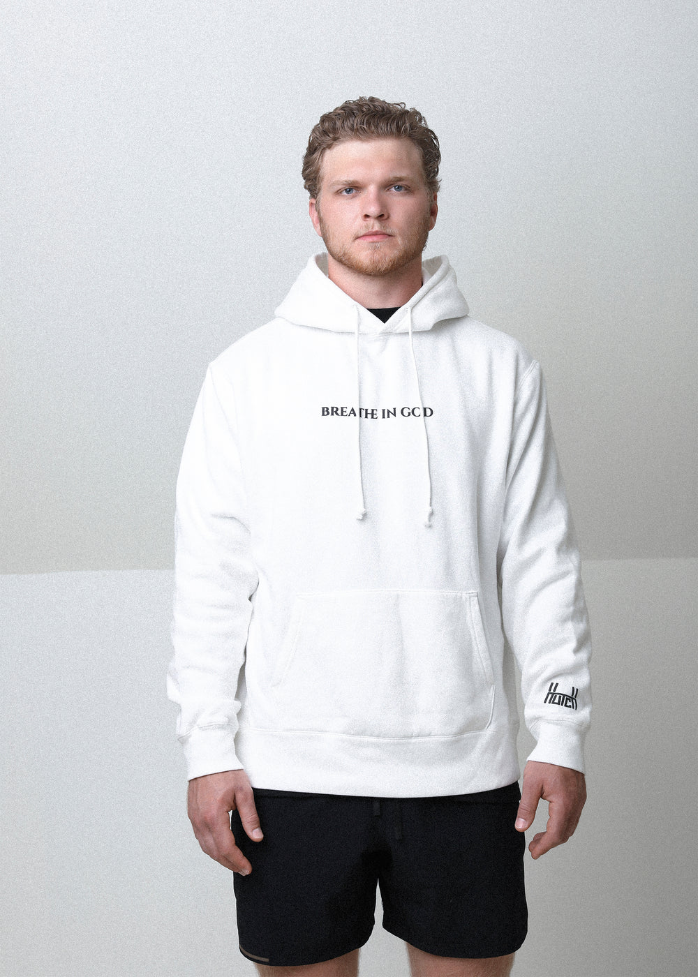 Aidan Hutchinson's Hutch Breathe In God Hoodie - Shop official Aidan Hutchinson merchandise from the House of Hutch